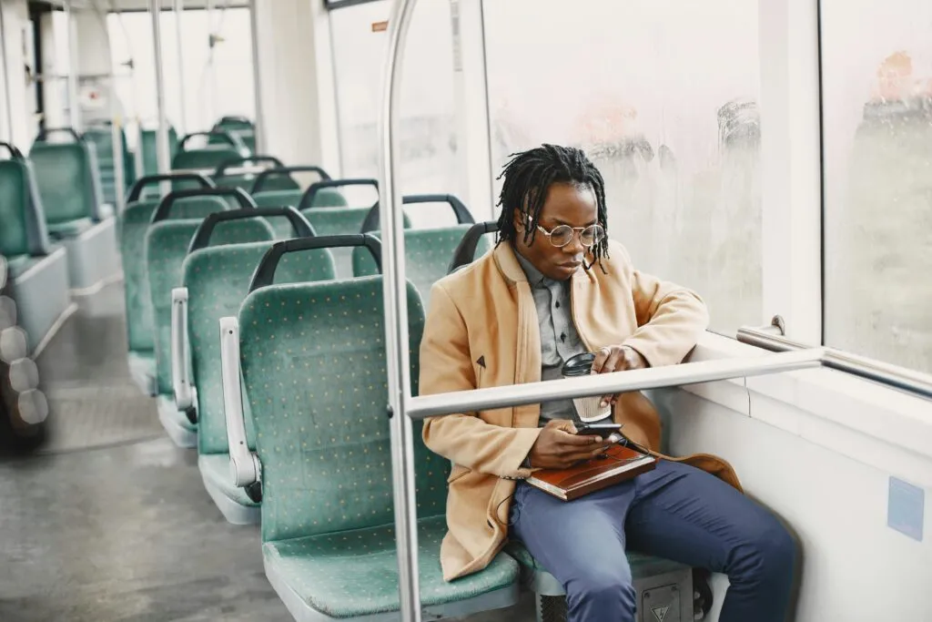 Charter bus rental reviews NYC: family boarding Brooklyn Bridge