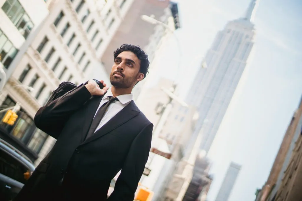 Executive team boarding luxury executive shuttle service NYC with ZoloBus driver